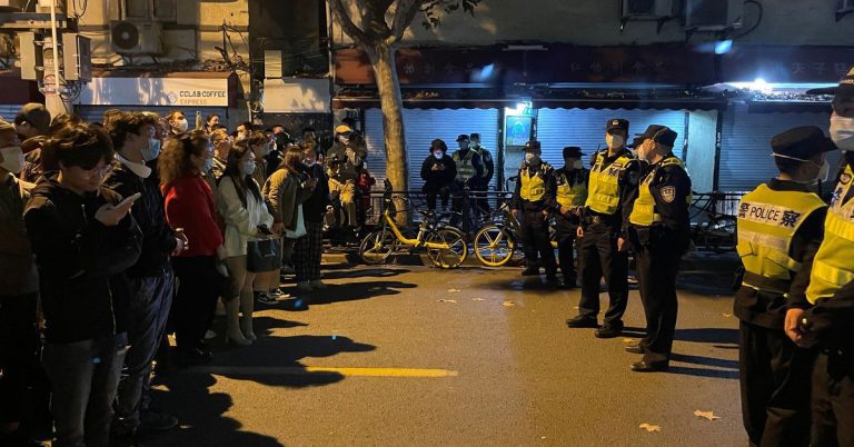 Shanghai protesters and police crowd as anger mounts over China's restrictions on the spread of the coronavirus

