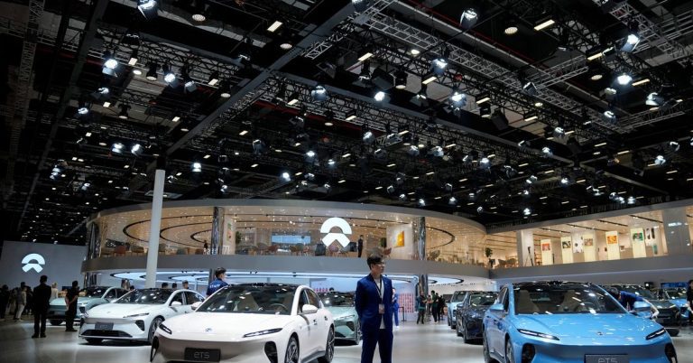 China's Nio cuts prices and ends free battery swaps as sales plummet

