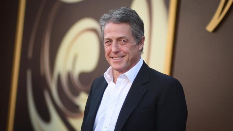 Hugh Grant says he was awarded a 'huge sum' to settle lawsuit alleging illegal hacking by The Sun newspaper