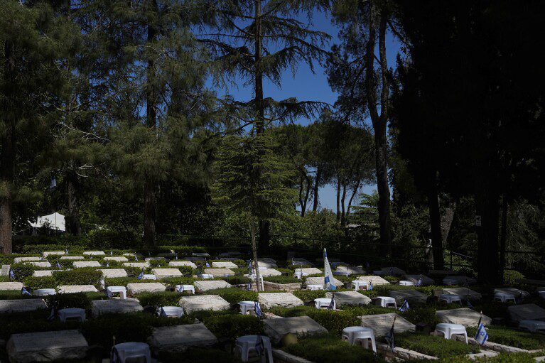 A view of Mount Herzl Military Cemetery in Jerusalem, Thursday, May 9, 2024. Israel marks the annual Remembrance Day to commemorate soldiers who died in the country's conflicts, starting at sunset Sunday, May 12, until the evening of Monday, May 13.  (AP Photo/Ohad Zweigenberg)