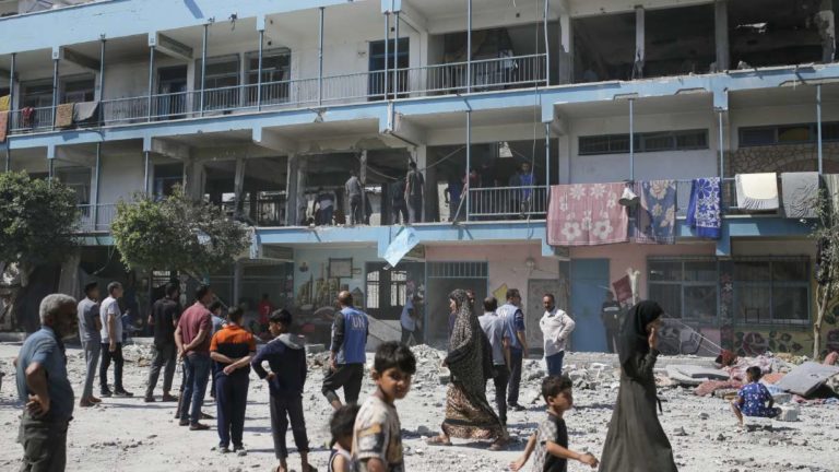 An Israeli raid kills at least 33 people at a Gaza school that the army claims is used by Hamas.