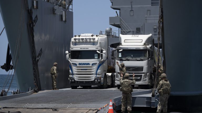 The US military shows reporters the dock project in Gaza as it makes another stab at delivering aid