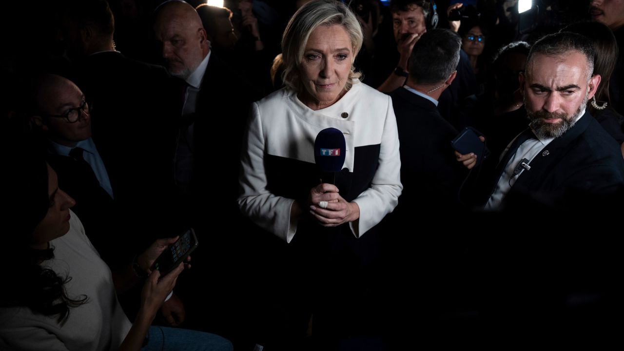 Marine Le Pen, leader of the far-right National Rally party, speaks to reporters in Paris after partial results showed her party would fall short of a majority. 