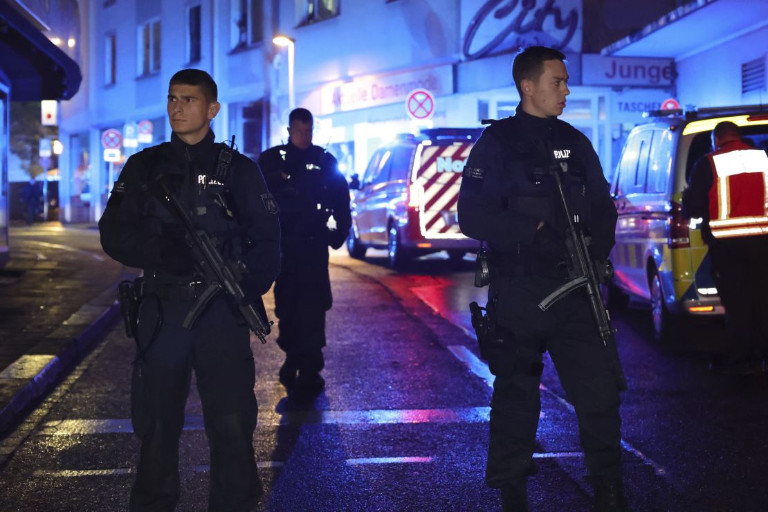 Police and ambulances near the scene of an attack at a festival in Solingen, where people were killed and injured.