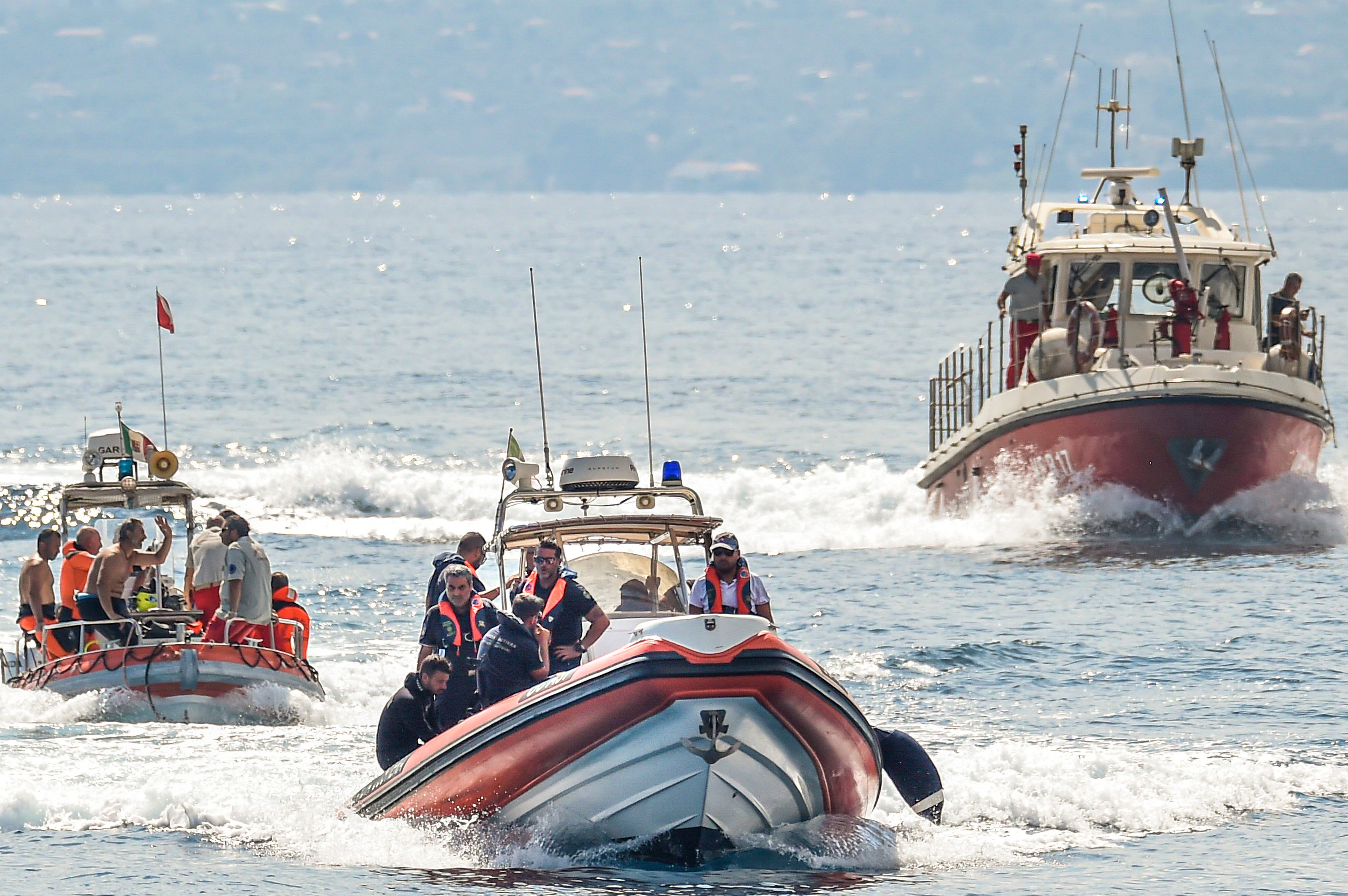 Emergency workers at the site of the sinking of the Bayzi.