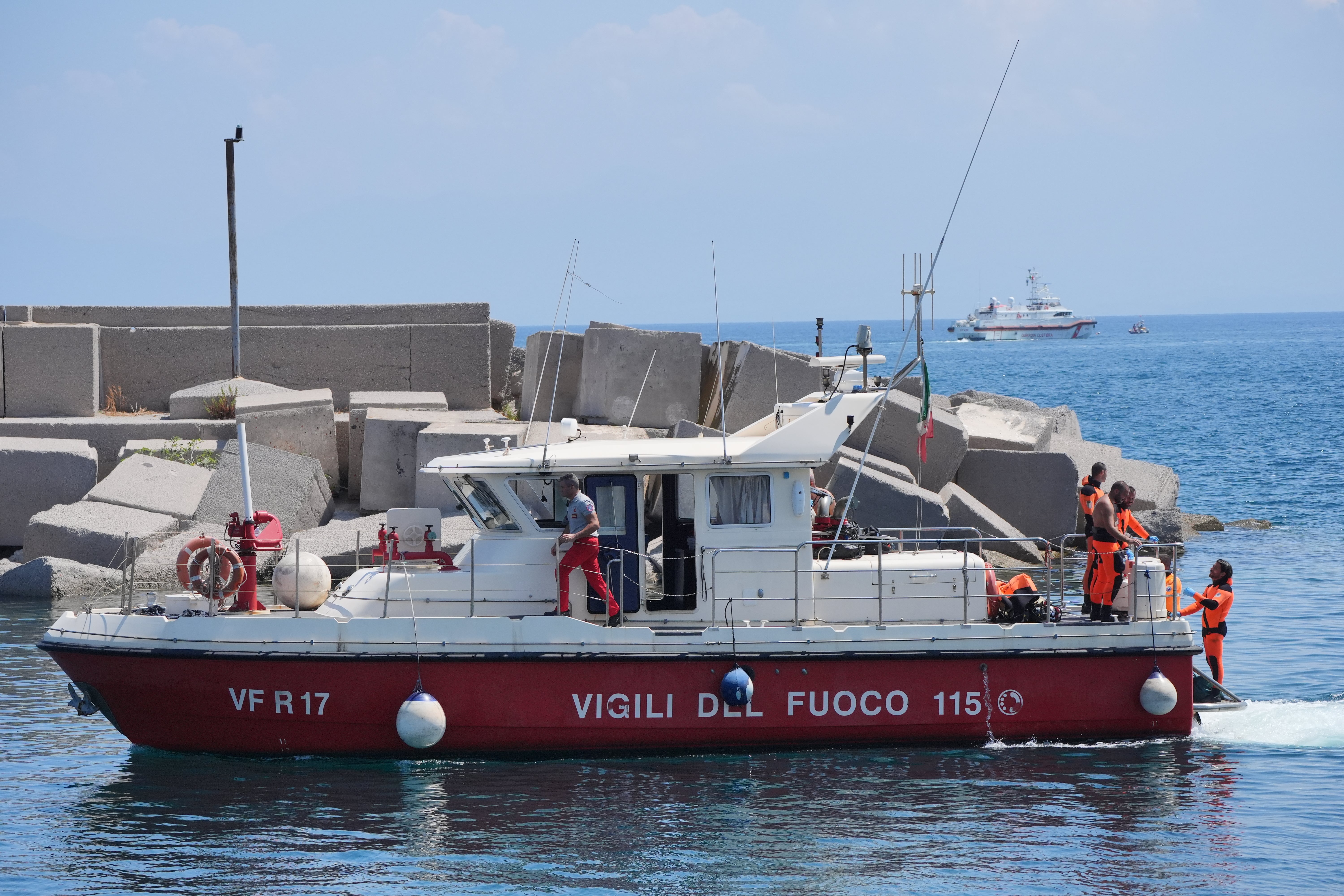 Fire Service dive boat carrying body of Hannah Lynch returns to Porticello harbour after she became seventh person confirmed dead in crash